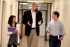 2/24/12 - Josselyne Bustillo, freshman political science major, Micah Watson, assistant professor of political science, and Luke Trammel, sophomore political science major, chat in the hallway. - Kristi McMurry