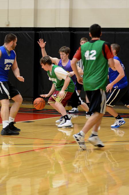 Matthew McSwain, sophomore athletic training major, guards Chad Buckley, senior history major, during a men's upper division intramural basketball game. 