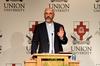 Peter Leithart, senior theology scholar at New Saint Andrews College in Moscow, Idaho, talks about Constantine initiating a revolution in Roman politics during his lecture in the Carl Grant Events Center. - Photo by Anne Richoux