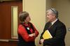 Carla Sanderson, provost and executive vice president, talks with Tom Cooper, author of <em>Fast Media/Media Fast</em> and professor of visual and media arts at Emerson College, before Cooper's address at the Town & Gown lecture series. - Photo by Zac Calvert