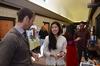 Phillip Ryan, associate professor of language and coordinator of the ESL program, chats with Kendra Loh, sophomore psychology major, about her home in Malaysia during CultureFEST. - Photo by Zac Calvert