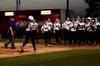 03/13/12 - The Lady Bulldog softball team celebrates as Stephanie Saunders runs to home plate during a double-header against Freed-Hardeman University. The Lady Bulldogs won both games 2-0. 