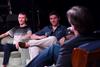 Devin Hall, freshman theatre/speech major, and Peyton Penuel, freshman digital media studies major, listen to a question asked by Chris Blair, professor of communication arts, during the Student Film Festival. - Photo by Jacob Moore