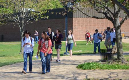 Leah Hamilton, sophomore sociology major, and Kirby Wilson, sophomore special education major, along with other students leave the Penick Academic Complex after class.