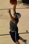 Matt Arnold, junior Christian studies major, goes up for a shot during a basketball competition in the Bowld Student Commons.  - Photo by Anne Richoux