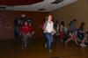 Caitlyn Miller, sophomore art major, Melissa Fields, junior business administration major, and Rachel Emanuel, sophomore TESL major, rush into the Bowld Student Commons for Eggstravaganza, an event hosted by Residence Life. - Photo by Zac Calvert
