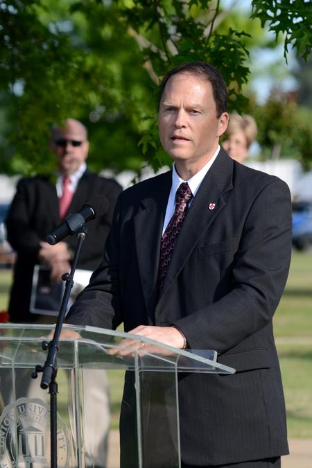 4/12/12 - Gary Carter, senior vice president for business services, gives a dedicatory reading during the groundbreaking ceremony for the new library.