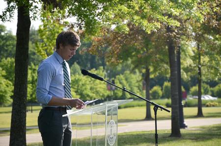 4/12/12 - Karl Magnuson, senior engineering major, gives a dedicatory prayer during the groundbreaking ceremony for the new library.