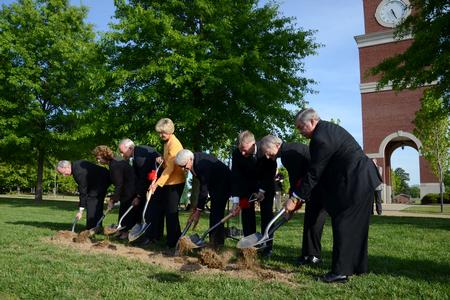 4/12/12 - Dirt is turned during the groundbreaking ceremony for the new library. Pictured is David S. Dockery, Anna Beth Morgan, Jim Campbell, president and COO of TLM Architects/Engineers; Carol and Bill Latimer, major donors for the project; Rod Parker, chairman of the Board of Trustees; Harry Smith, past chairman of the Board of Trustees; and Frank Wagster, principal architect of H&M Construction.