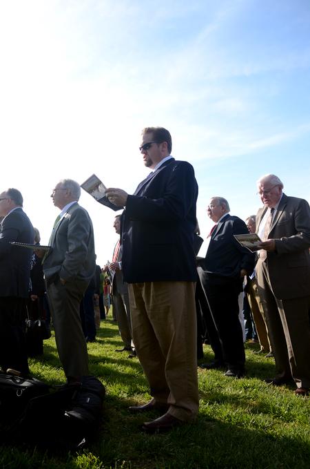 4/12/12 - Hunter Baker (center), associate professor of political science, and other guests sing 'Great is Thy Faithfulness' during the groundbreaking ceremony for the new library.