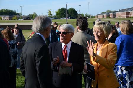 4/12/12 - Harry Smith, past chairman of the Board of Trustees, talks with donors Bill and Carol Latimer after the groundbreaking ceremony for the new library.