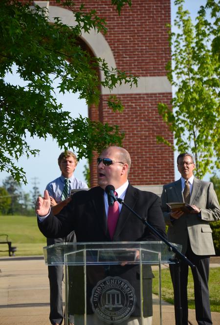 4/12/12 - Ricky Clark, Union alumnus and minister of music and worship, leads trustees, faculty, staff, students and community members in 'Great is Thy Faithfulness' during the groundbreaking ceremony for the new library.
