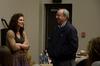 Kylie McDonald, junior political science major, talks with David S. Dockery, president of the university, prior to a Student Senate meeting. - Photo by Anne Richoux