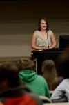 Christa Seyler, freshman nursing major, gives a campaign speech during a Student Senate meeting.  - Photo by Anne Richoux