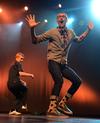 Grant Braden, sophomore broadcast journalism major, performs with Nick Fleming, freshman theatre/speech major, during the Lambda Chi Alpha performance at the 15th annual Variety Show. - Photo by Jacob Moore