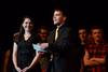 SAC members AlLee Browning, junior elementary education major, and Matt Parker, senior business administration major, announce category winners during the 15th annual Variety Show. - Photo by Jacob Moore