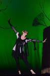 Joanna Hull, senior biology major, plays the role of a spider as part of the act by "Once Upon A Time" during the 15th Annual Variety Show. - Photo by Zac Calvert