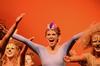Hollie Garland, sophomore sports medicine major, plays the role of a bird during the Chi Omega's Lion King act at the 15th Annual Variety Show. - Photo by Zac Calvert