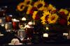 Bouquets of sunflowers and roses decorate the tables during the fourth annual Roy L. White Legacy Golf & Gala at the Carl Perkins Civic Center. - Photo by Jacob Moore