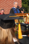 T. W. Hunt, a professor emeritus at Southwestern Baptist Theological Seminary, gave the invocation. Hunt’s grandson Paul Monroe graduated with a major in marketing. - Photo by Kristen Nicole Sayres