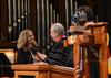 David S. Dockery, president of the university, presents the Staff of the Year award to Christy Young, coordinator of special programs and administrative assistant to the dean of the school of theology and missions, during the annual Awards Day chapel service. - Photo by Jacob Moore