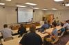 Professor of Engineering and Department Chair Don Van welcomes guest to the Senior Engineering Capstone Project. - Photo by Morris Abernathy