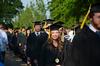 5/19/12 - Andi Schreiber, family studies graduate, smiles at some of her friends during the beginning processional of spring graduation. 
 - Zac Calvert