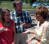 Learning Foundations graduate Bethany Davis and her father visit with Union alumni staffer Belinda Moss at the graduation reception held in Ayers Courtyard. - Photo by Kristen Hiller
