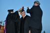 Lloyd Hansen receives an honorary doctor of letters degree during spring graduation. - Photo by Morris Abernathy
