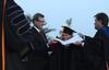 William Latimer, III, major donor for the new library project, receives an honorary doctor of humanities degree at spring graduation. - Photo by Jacob Moore