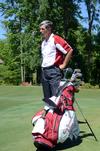 Andy Rushing, head golf coach, watches his players on the course.  - Photo by Zac Calvert