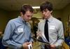 Junior engineering majors Brady Sheppard and Jon Vunk look through materials from local companies during the Engineering Expo.  - Photo by Jacob Moore