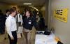 Ky Bailey, junior engineering major, talks to Roger Smith from Logical Systems Inc. during the Engineering Expo.  - Photo by Jacob Moore