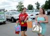 Anna Marie Deschenes, senior social work major, helps Kathryn Dunlap, incoming freshman, as she moves into her residence complex on new student move-in day. - Photo by Ebbie Davis