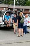 Chris and Taylor Townsend talk with Kayla Clary, Union alumnus, and Phyllis Davenport, coordinator of campus events and chapel facilitator, during new student move-in day. - Photo by Anne Richoux