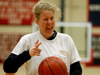Women's assistant basketball coach Katie Woodruff (Coach K) hams it up for the camera shortly before playing in an intramural basketball game. - Photo by Jonathan Blair