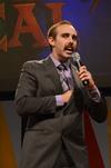 Daniel Stands, senior biblical languages major, hosts Let's Make A Deal during the annual SAC game show. - Photo by Zac Calvert
