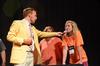 Ryan Linkous, senior biblical languages major, asks Carly Daniel, freshman business administration major, a question during the annual SAC game show.  - Photo by Zac Calvert