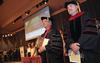 David S. Dockery, president of the university, and Todd Brady, vice president of spiritual life, watch as the faculty of Union University enter the George M. Savage Memorial Chapel for Fall Convocation. - Photo by Morris Abernathy