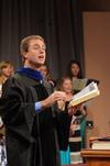 Chris Mathews, associate professor of music and department chair, leads music during Fall Convocation. - Photo by Zac Calvert