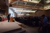 Chris Mathews, associate professor of music and department chair, leads the congregation of students, faculty and staff in singing "Joyful, Joyful We Adore Thee" during Fall Convocation. - Photo by Zac Calvert