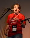 Crysten Casey, freshman art major, recites a self-written, Christian rap declaring the gospel at the annual Open Mic Night during Focus week.  - Photo by Ebbie Davis