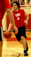 Sophomore Wes Calvert drives down the court during an intramural basketball game. - Photo by Jonathan Blair