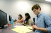 9/17/12 - Kaitlen Graves, sophomore English education major, Noemi Sisalema, freshman international business major, and Robert Paul Stephens, junior business and marketing major, look through information sheets during a seminar addressing the question, 'What Can I Do with a Major in Computer Science?' - Anne Richoux