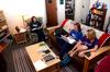 Kyleigh Carter, junior social work major, Laura Kay Richardson, junior elementary education major, and Jessica Hatfield, junior education major, laugh and chat while studying together in their residence life apartment  in the Grace quad.  - Photo by Anne Richoux