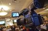 Ross Douthat, New York Times columnist and author, speaks at Union Forum as a camera captures his talk. - Photo by Morris Abernathy
