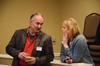 Jerry Tidwell, senior vice president for university relations, speaks to Kimberly Thornbury, senior vice president for student services and dean of students, during the President's Brunch, a Family Weekend activity. - Photo by Zac Calvert