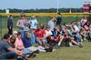 Family and parents line the fields at West Jackson Baptist Church as students play intramural football during Family Weekend. - Photo by Zac Calvert