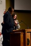 Madison County Sheriff David Woolfork presents Theresa Blakley, professor of social work, with a certificate of appreciation for her work with the Remember Me Commemorative Walk held at Union University. - Photo by Jacob Moore