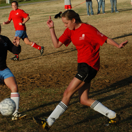 Sophomore Lendy Wilson drives the ball down the field during an intramural soccer game.